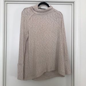 Tan turtleneck sweater